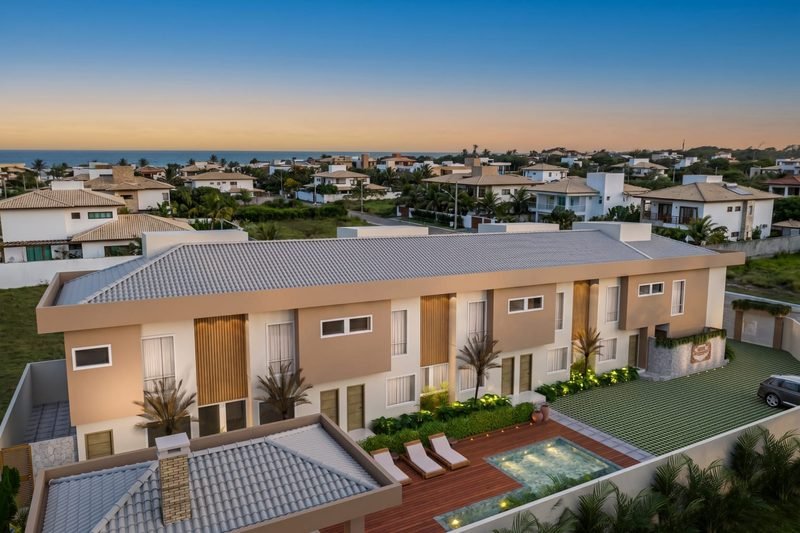 Vista aérea do Almare Mutá Residence com piscina e o mar ao fundo